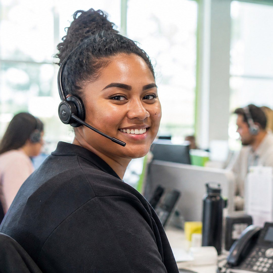 Illustration of a customer support agent at a workstation